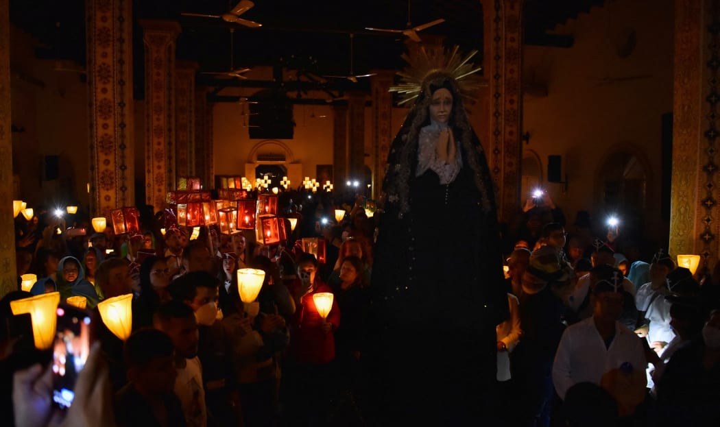 Catholics participate in a Good Friday procession commemorating the death of Christ, in Paraguay.
