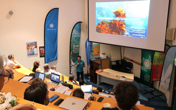 Founder and CEO of Blue Cradle James Nikitine in Tahiti conducting a workshop on marine invasive species in Tahiti.