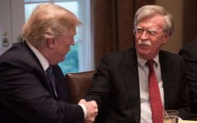 US President Donald Trump with National Security Advisor John Bolton during a meeting with senior military leaders at the White House in Washington, DC.in April 2018.