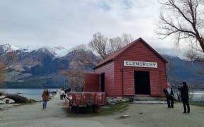 Tourists at the Red Shed in Glenorchy.