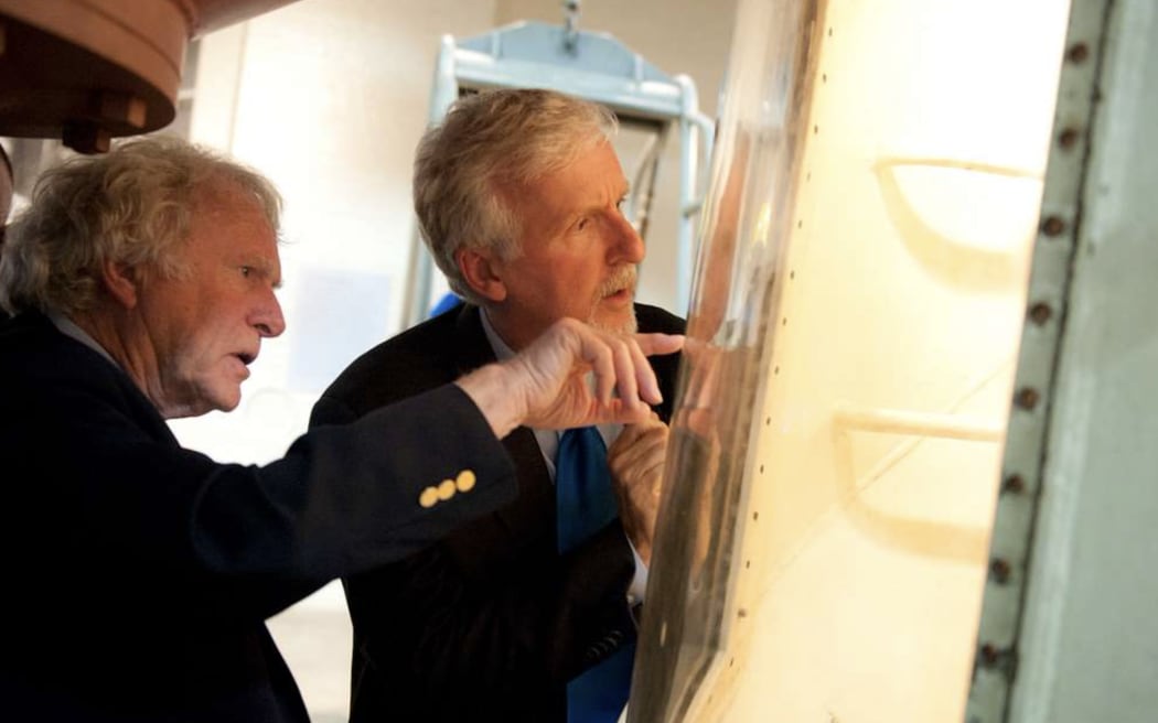 Dr. Don Walsh, a retired U.S. Navy captain, talks in 2013 to acclaimed filmmaker James Cameron about the Trieste, a deep-diving research bathyscaphe which reached the deepest known part of the earth's oceans, the Challenger Deep in the Mariana Trench near Guam, on Jan. 23, 1960.