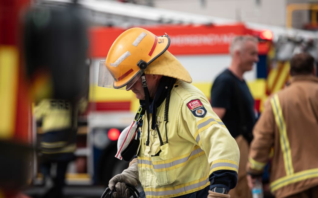 Firefighters at a blaze at house in Yule Street, Wellington.