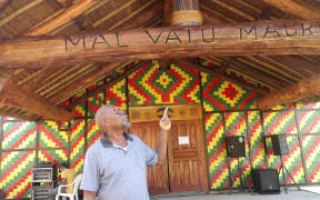 CEO Jean Pierre Tom in from of building housing Vanuatu's Malvatumauri