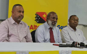 Kerenga Kua, middle, speaking to media. 29 February 2024