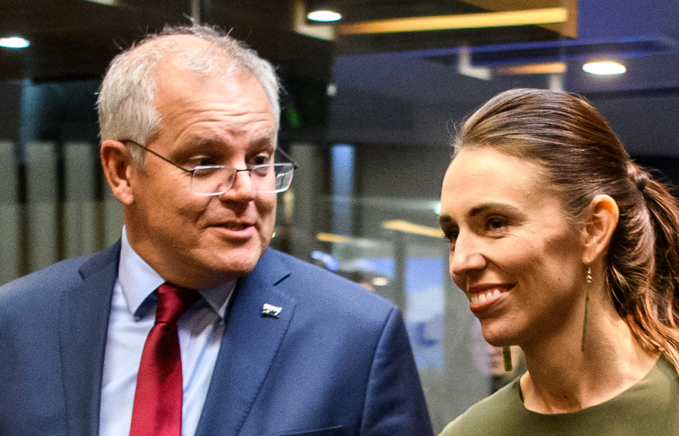 Australian Prime Minister Scott Morrison and New Zealand Prime Minister Jacinda Ardern arriving at a reception for the annual Australia-New Zealand Leaders' meeting in Queenstown on May 30, 2021.