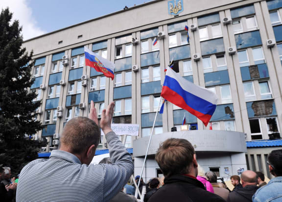 People outside the Security Service building taken over in Lugansk.