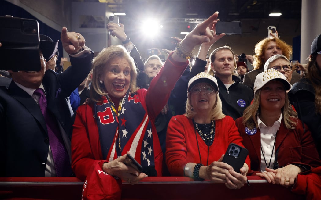 Supporters of Republican presidential candidate, former U.S. President Donald Trump cheer during his caucus night event at the Iowa Events Center on January 15, 2024 in Des Moines, Iowa. Iowans voted today in the state’s caucuses for the first contest in the 2024 Republican presidential nominating process. Trump has been projected winner of the Iowa caucus.