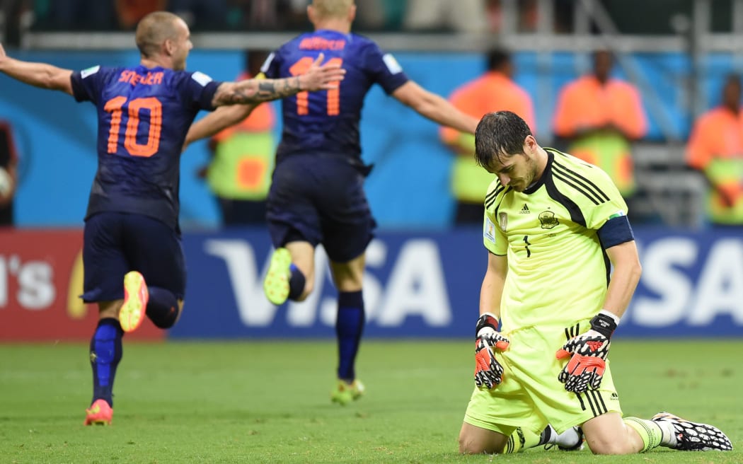 Spain's goalkeeper Iker Casillas reacts after Netherlands' forward Arjen Robben scored his team's fifth goal.