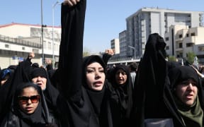 Iranian protestors shout slogans during a demonstration against Saudi Arabia following the stampede.
