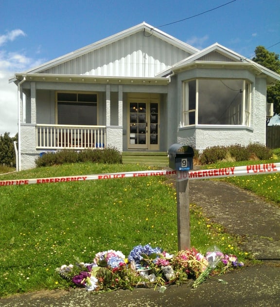 Neighbours and friends left flowers on Friday.