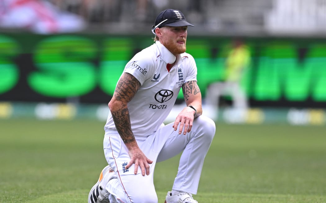 England captain Ben Stokes looks on as a ball races away to the boundary for four runs on Day 2 of the First Ashes Test between Australia and England at Perth Stadium in Perth, Saturday, November 22, 2025. (AAP Image/Dave Hunt / Photosport) NO ARCHIVING, EDITORIAL USE ONLY