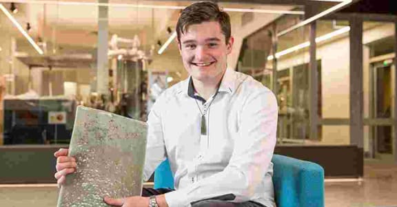 Logan Williams holds the didymo bioplastic which he invented