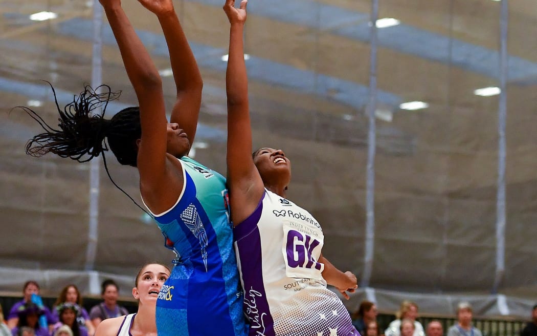 Daystar Swift (right) played one round of ANZ Premiership netball.