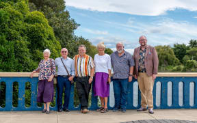 Ann (left) and Ray Harper, joined with Waimakariri Deputy Mayor Neville Atkinson, Kaiapoi-Tuahiwi Community Board chairperson Jackie Watson, councillor Philip Redmond and Mayor Dan Gordon on the Williams Street bridge in Kaiapoi.