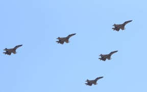 J-16 fighters flying during a military parade at Zhurihe training base in north China in 2017.