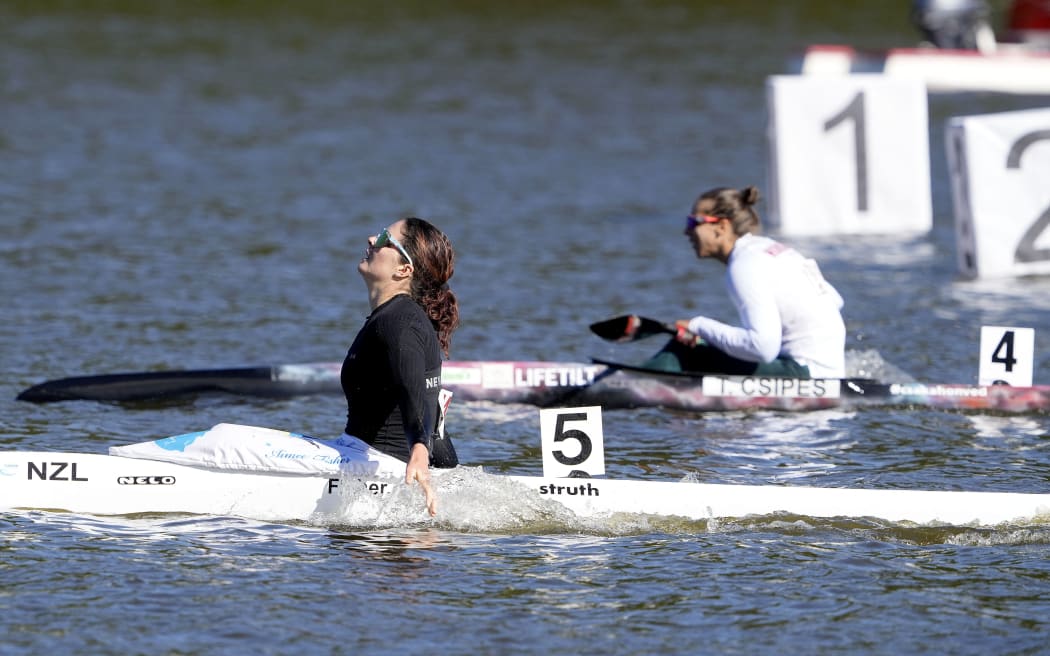 New Zealand's Aimee Fisher reacts after winning the women's K1 Kayak 500 metre final of the Canoe and Kayak sprint Worlds Championship 2021 at Bagsvaerd Lake, in Copenhagen, Denmark, on September 19, 2021.