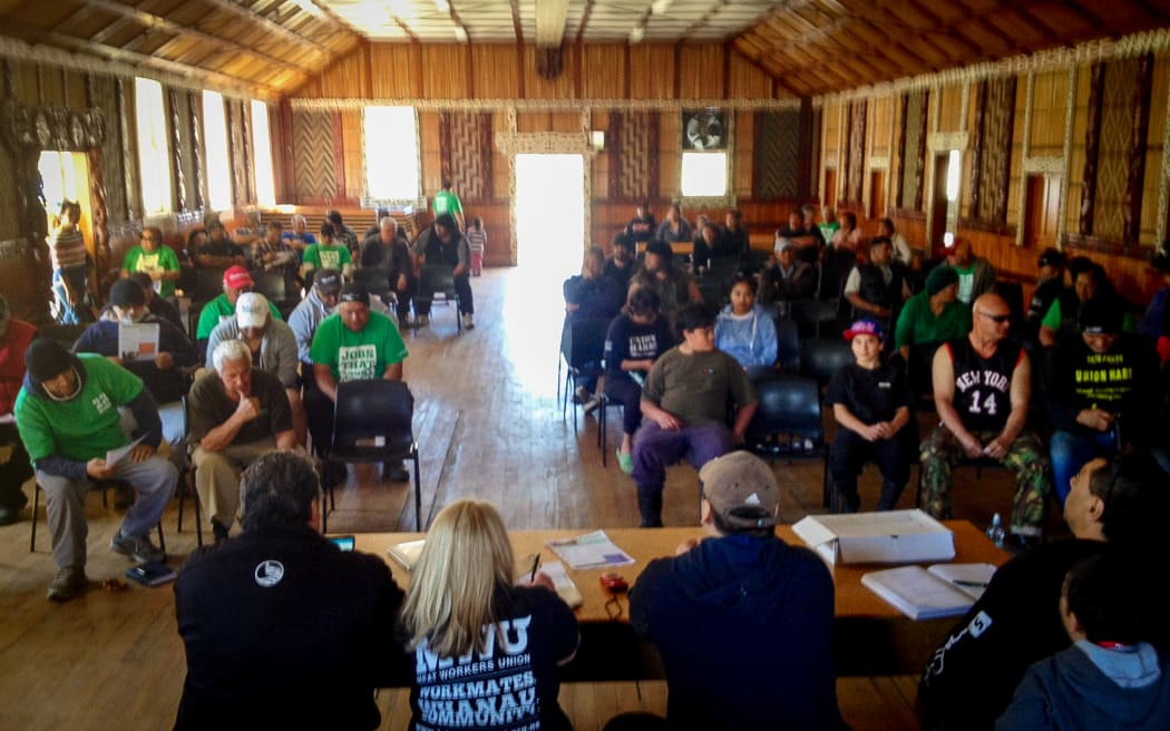 Workers waiting for a Shed Meeting to begin at the Taihoa Marae, Wairoa.