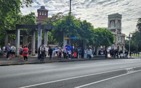Protesters outside the High Court at Auckland where are hearing is taking place over a critically ill baby whose parents oppose giving him blood from anyone who has had a Covid-19 vaccine.