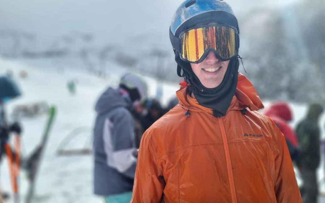 Snowboarder Paul trekked on foot for an hour through sleet to reach the skifield ahead of the road being opened.