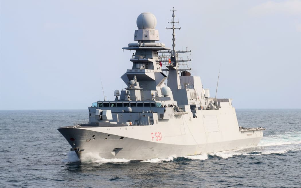 This unlocated and undated handout picture released by the Italian Navy (Marina Militare) shows the Italian frigate Virginio Fasan (F 591) at sea. Italy's Defence Minister Guido Crosetto sent the navy frigate to assist a Gaza-bound flotilla on September 24, 2025, after organisers said several of their boats had been targeted by multiple drones off Greece.