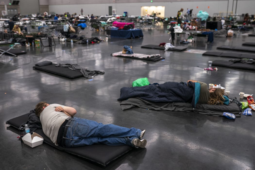 Portland residents fill a cooling centre with a capacity of about 300 people.