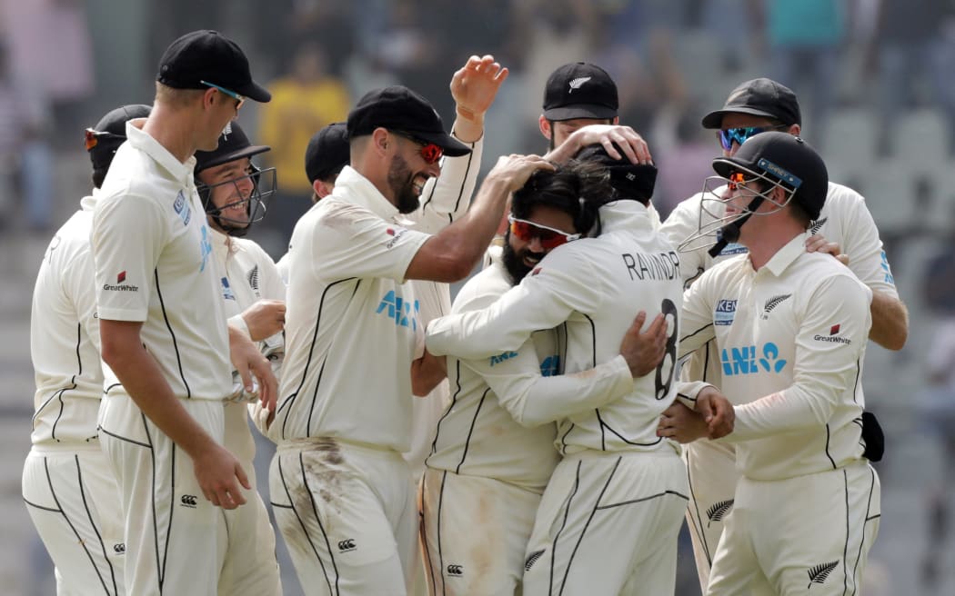 The Black Caps celebrate Ajaz Patel taking all 10 wickets in an innings on day two of the second test against India in Mumbai on the 4th December 2021.