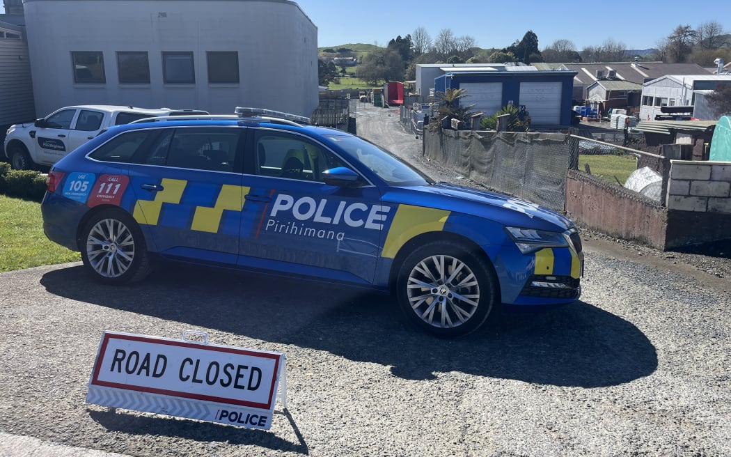 Police at the back of PGG Wrightson in Piopio.