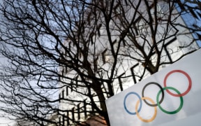 Olympic Rings are seen in front of the International Olympic Committee (IOC) headquarters on December 5, 2017 in Pully near Lausanne.