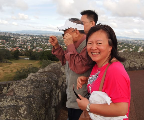 Cissy Chen with family members on One Tree Hill in Auckland.