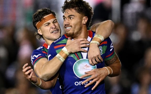 Chanel Harris-Tavita of the Warriors (right) celebrates with Samuel Healey after scoring a try during the NRL Round 14 match between the Cronulla-Sutherland Sharks and the New Zealand Warriors.
