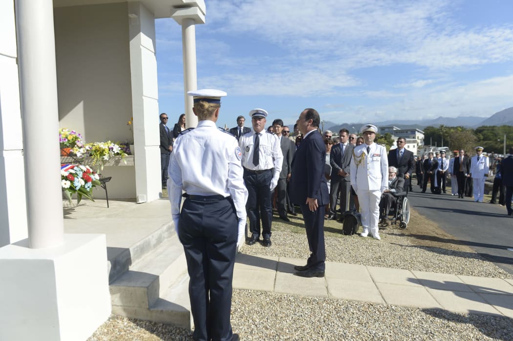 French President Francois Hollande at Jacques Lafleur's tomb