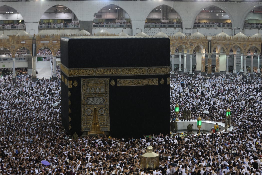 Muslims gather around the Kaaba, Islam's holiest shrine, at the Grand Mosque in the Saudi city of Mecca.