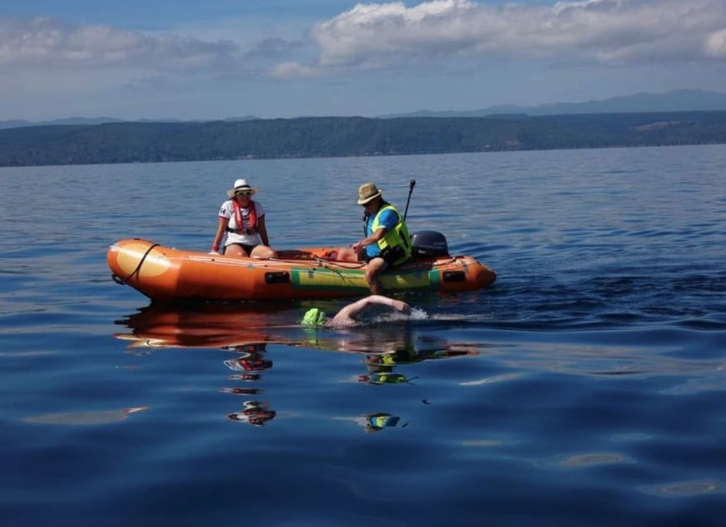 Caitlin O'Reilly swimming across Lake Taupō