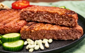Source of fibre plant based vegan soya protein grilled burgers, meat free healthy food close up