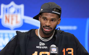 Shedeur Sanders speaks to the media during the 2025 NFL Scouting Combine at Lucas Oil Stadium on February 28, 2025 in Indianapolis.