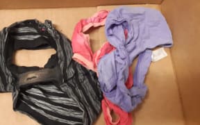 Some of the soiled clothing given in donations to The Koha Shop in Kaikohe.