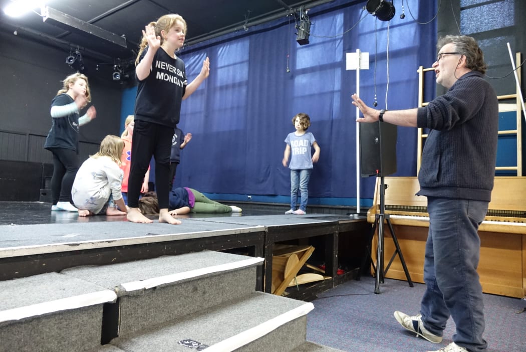 Theatre director Mike Friend taking students through their paces.