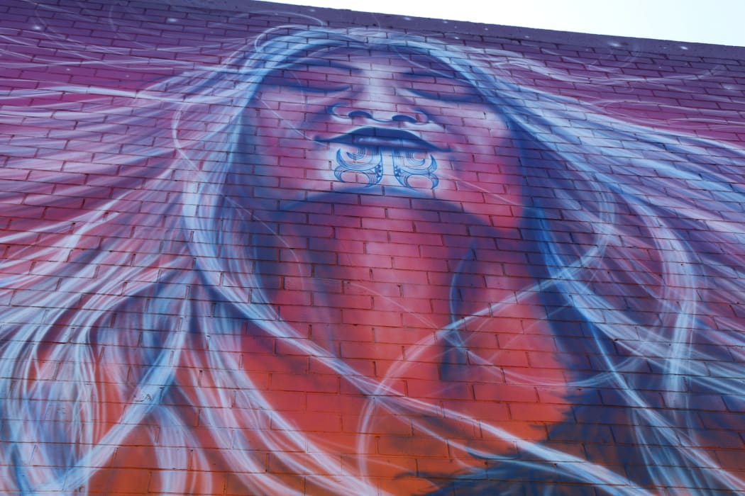 A mural depicting Hineteiwaiwa - the Māori goddess of weaving and fertility by artist Bobby MacDonald in Onehunga.