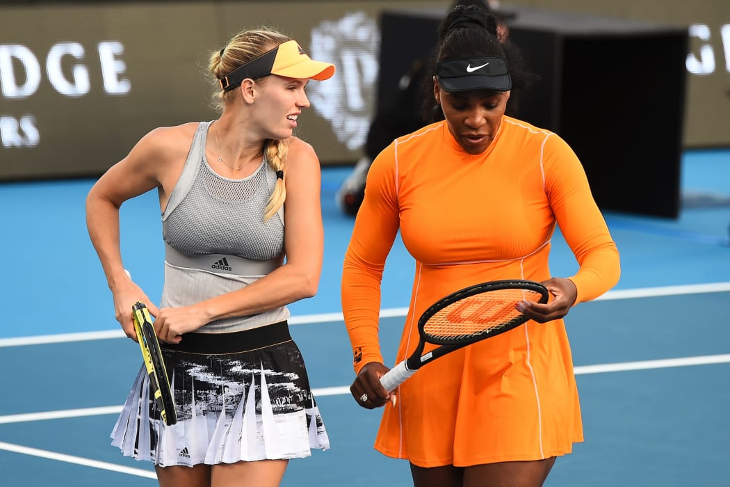 Caroline Wozniacki and Serena Williams during their doubles match against Johanna Larsen from Sweden and Caroline Dolehide during Day 3 of the 2020 ASB Classic Womens.