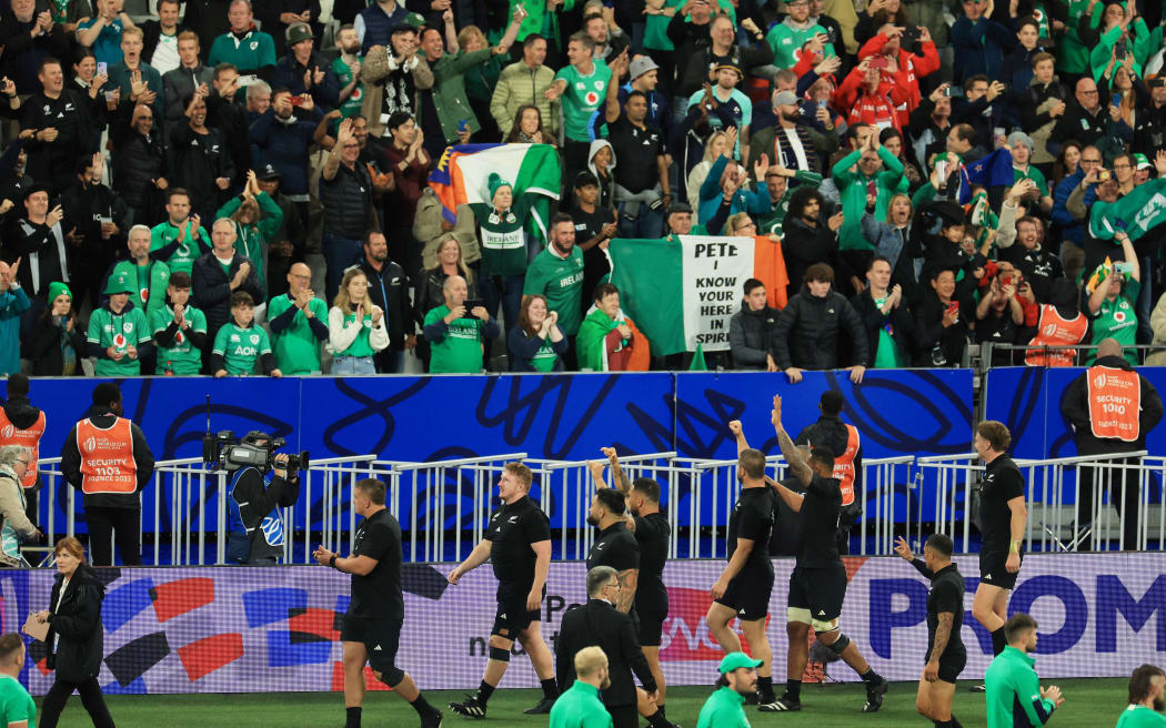 New Zealand players celebrate after winning their quarter-final Rugby World Cup 2023 match between Ireland and New Zealand