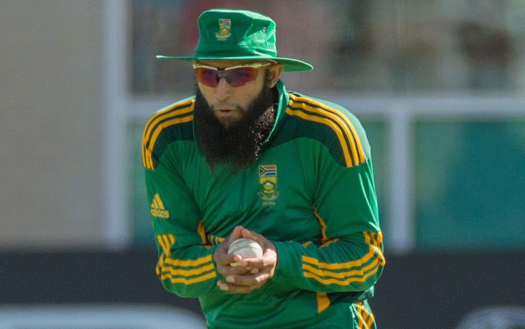 South African captain Hasim Amla takes a catch in England, 2012.