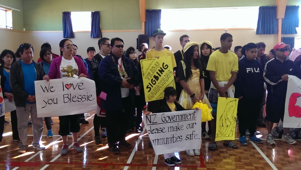 People at a Filipino cultural event in Auckland prayed for Blessie Gotingco.