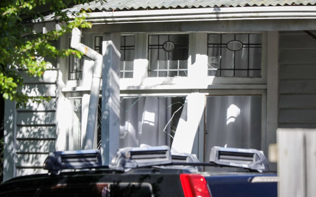 A house with a broken front window near where a person was found dead in Riccarton, Christchurch, 1 November 2022.