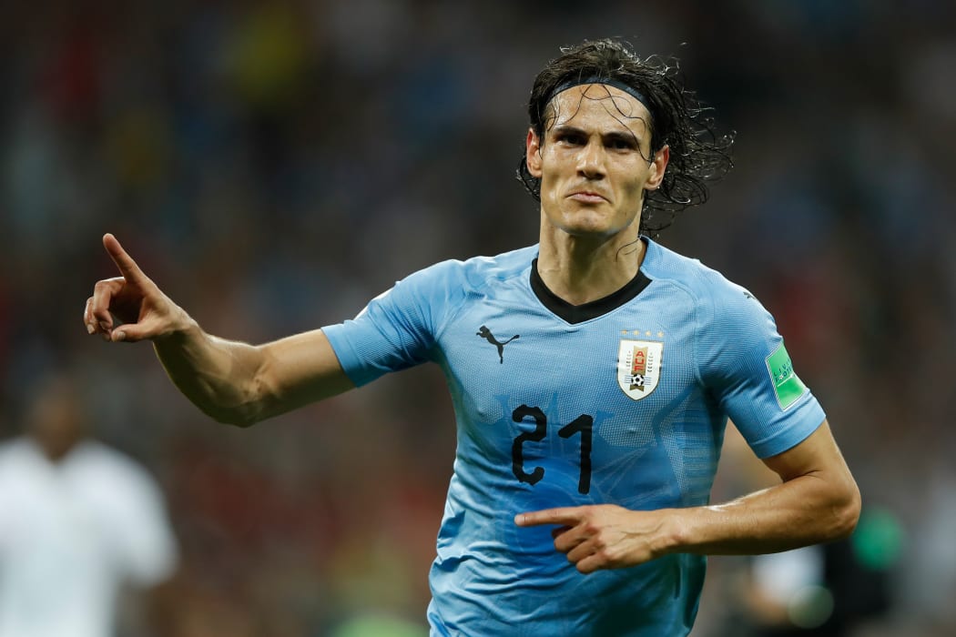 Uruguay's forward Edinson Cavani celebrates after giving his team the lead with his second goal during the Russia 2018 World Cup round of 16 football match between Uruguay and Portugal at the Fisht Stadium in Sochi on June 30, 2018. / AFP PHOTO / Odd ANDERSEN