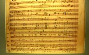 Facsimile of Dies Irae page from Requiem in D minor by Mozart
