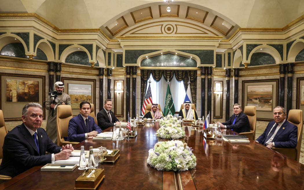 (L to R) US Middle East envoy Steve Witkoff, Secretary of State Marco Rubio, National Security Advisor Mike Waltz, Saudi Arabia's Foreign Minister Prince Faisal bin Farhan al-Saud, National Security Advisor Mosaad bin Mohammad al-Aiban, the Russian president's foreign policy advisor Yuri Ushakov, and Russia's Foreign Minister Sergei Lavrov attend a meeting together at Riyadh's Diriyah Palace on February 18, 2025. Top US and Russian diplomats were meeting in Saudi Arabia on Tuesday for talks on resetting their countries' fractured relations and making a tentative start on trying to end the Ukraine war. Both sides played down the chances that the first high-level meeting between the countries since US President Donald Trump took office would result in a breakthrough. (Photo by Evelyn Hockstein / POOL / AFP)