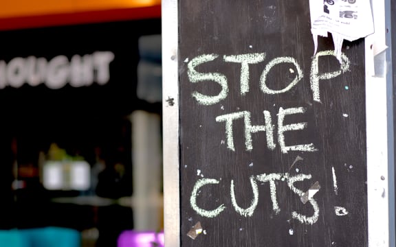 A sign protesting against Massey University's proposal to slash courses and jobs.