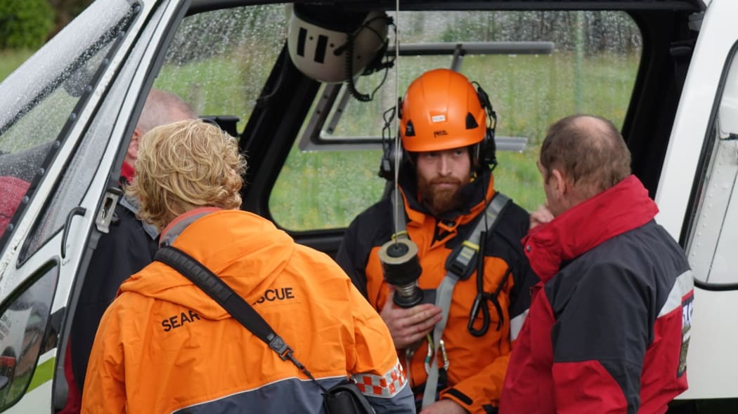 A recovery team prepares to leave for the crash site.