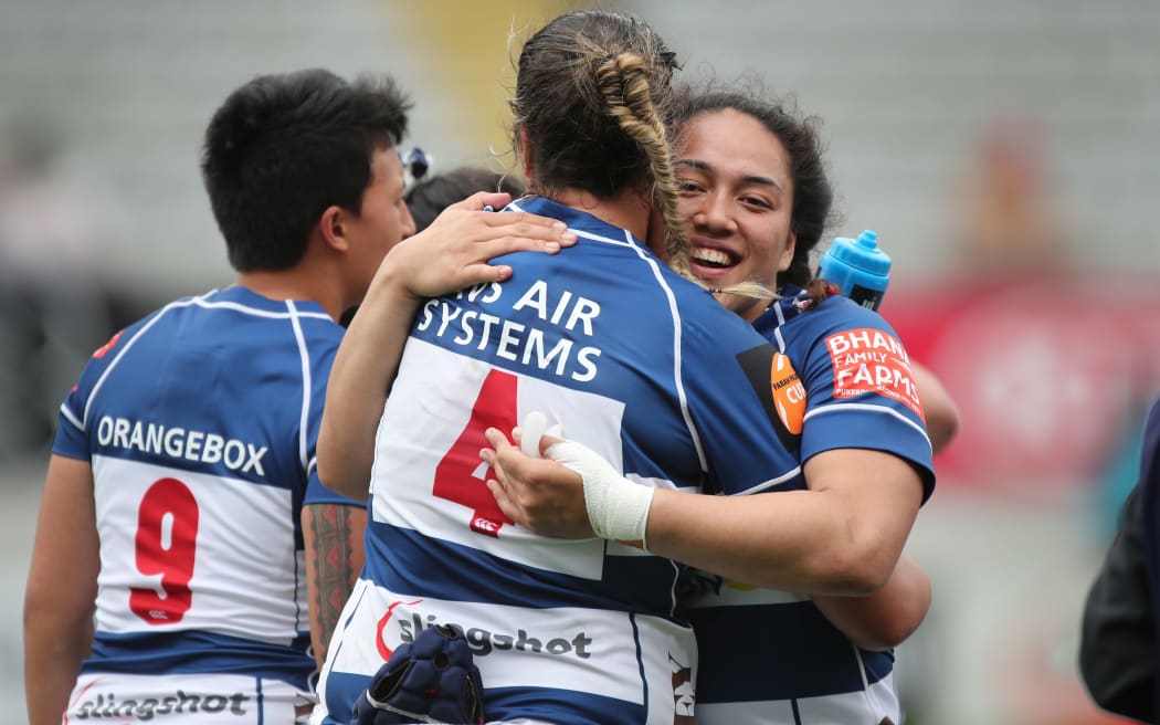 Auckland players Eloise Blackwell and Linda Itunu hug as the final whistle sounds during the Auckland Storm vs Wellington Pride Farah Palmer Cup rugby semi final held at Eden Park 2019.