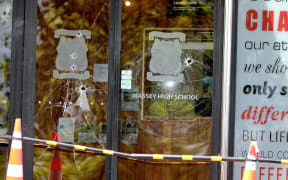 Massey High School principal Alastair Fairley said a large number of windows at the front of his school were smashed using blunt objects, and school vehicles also had windows smashed.
